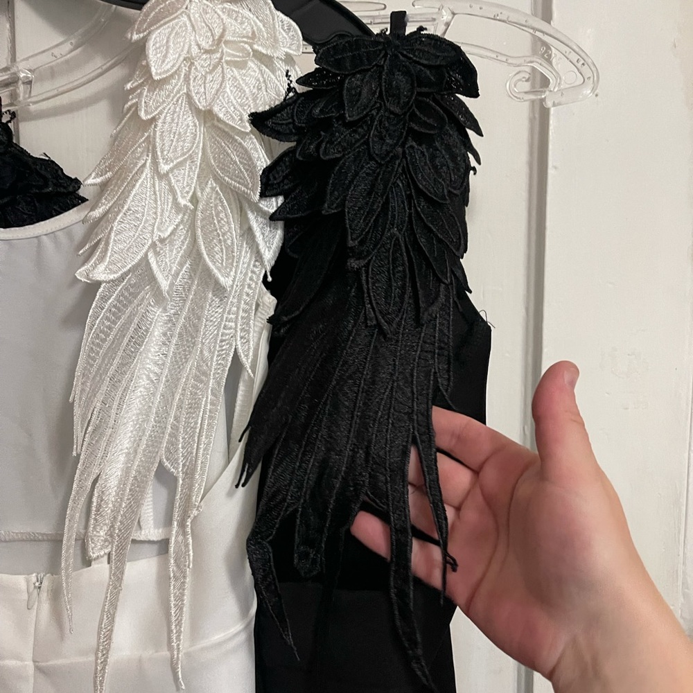 Great Halloween costumes for two. Angel & Devil dress with wings.